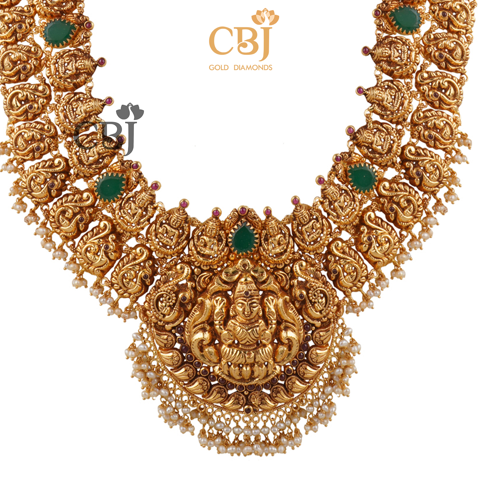 A light weight nakashi U-haram featuring emeralds and micro-pearls.