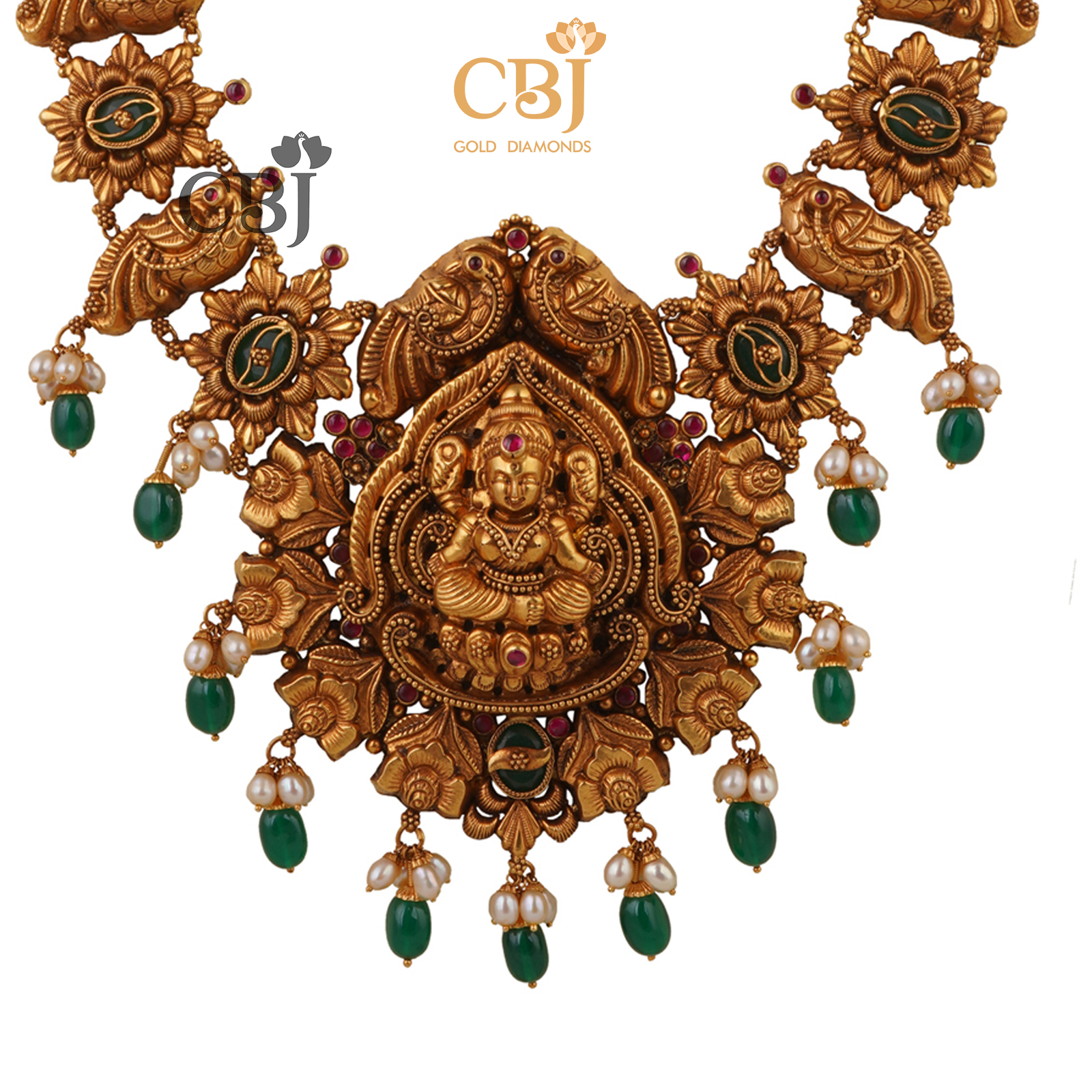 Stunning deep nakas haram featuring emerald stones.