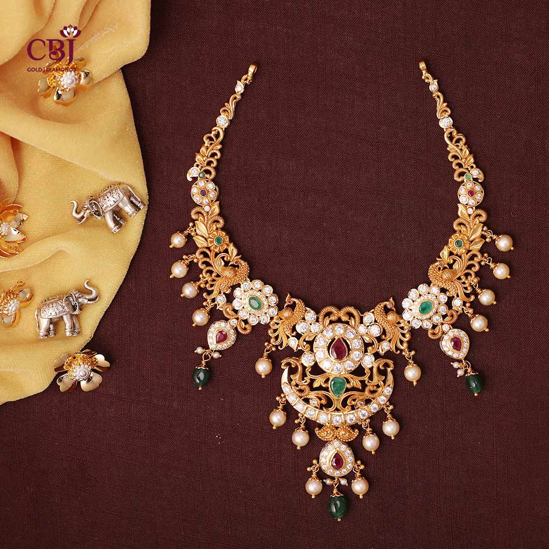 A radiant design which features CZs in floral patterns, also highlighting stones like rubies, emeralds and pearls.  #CZPachiCollection