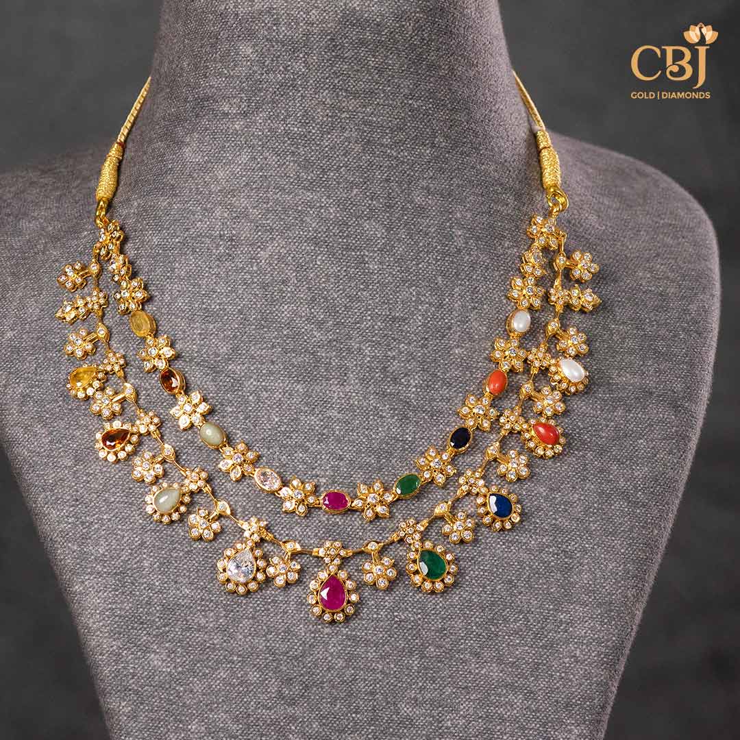 Embellish your look with the magnificence of Navaratna and the sparkle of CZ.