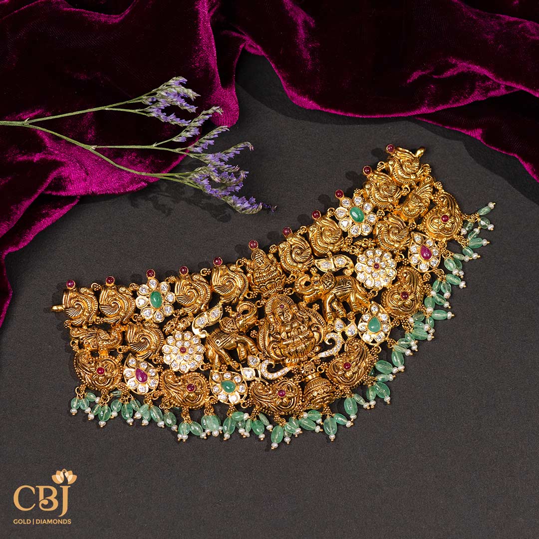 Channel the grace and charm of Goddess Lakshmi with our bold antique choker