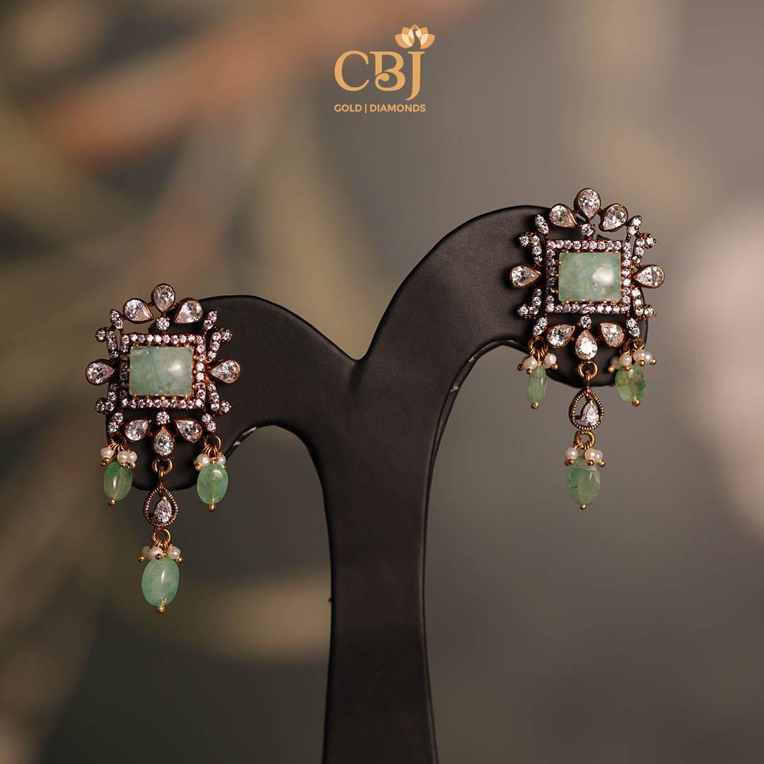 A scintillating piece of Victorian inspiration featuring CZs, pearls and emeralds.