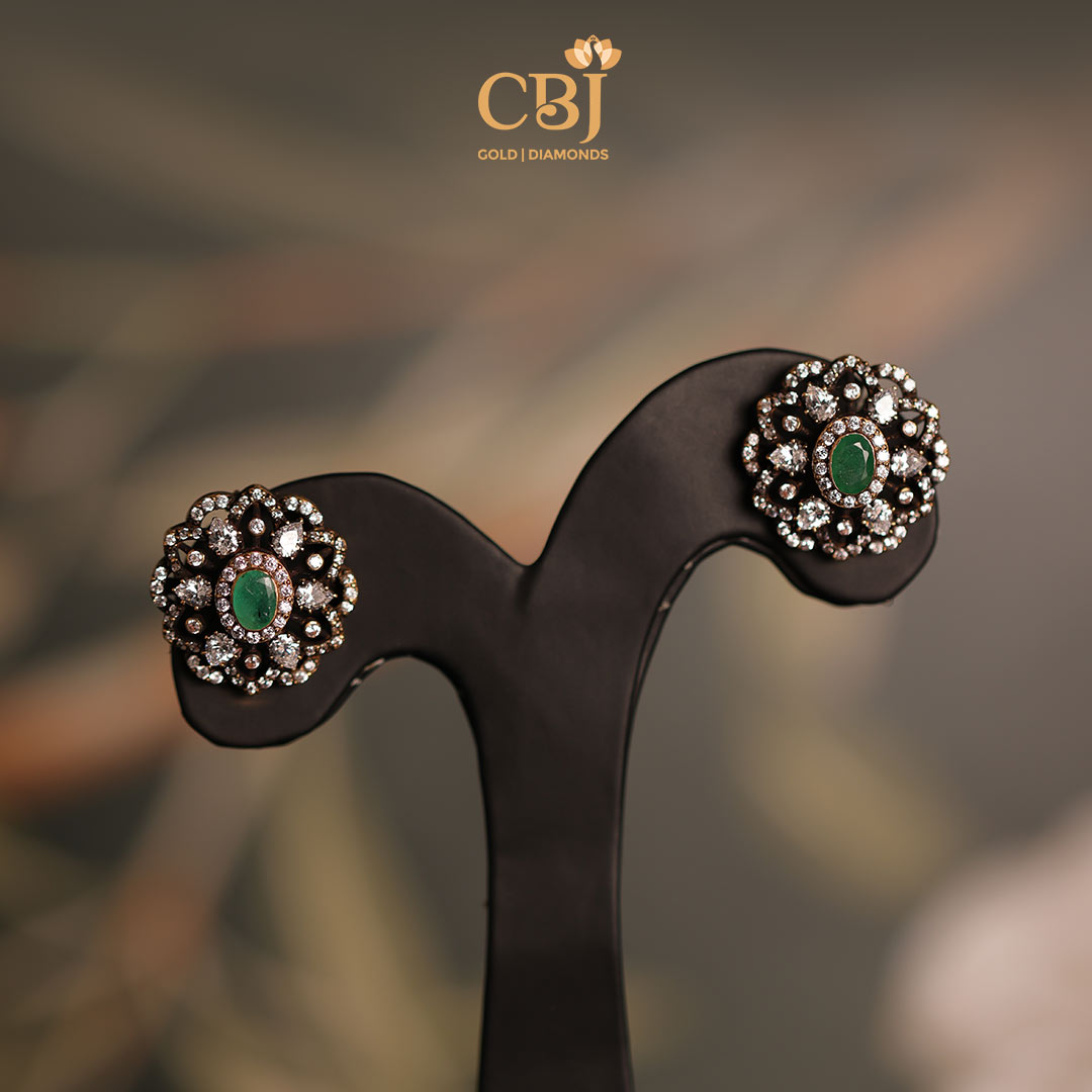 Embrace the opulence of these Victorian studs featuring a captivating emerald stone as the perfect finishing touch. 
