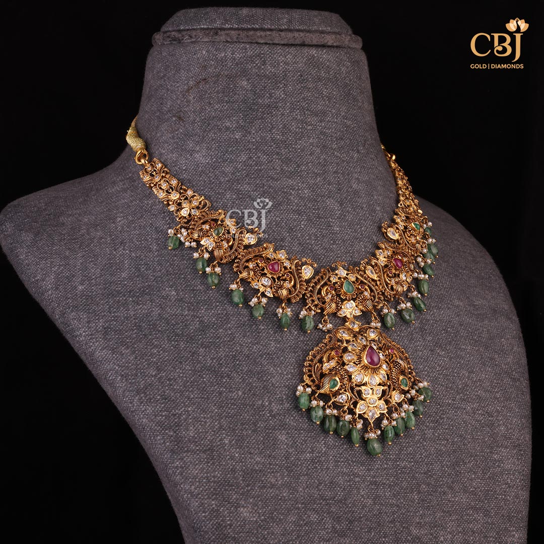 A traditional CZ pachi haram featuring ruby and emerald stones.