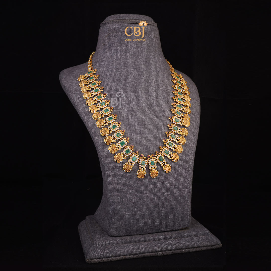 Exquisite Craftsmanship: Long CZ Pachi Kasumala adorned with Emerald Stones and Ruby Potas