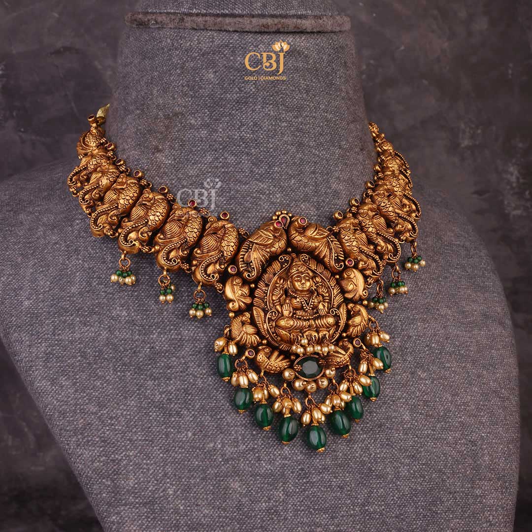 Antique Lakshmi Short Haram featuring peacock motifs decorated with rubies