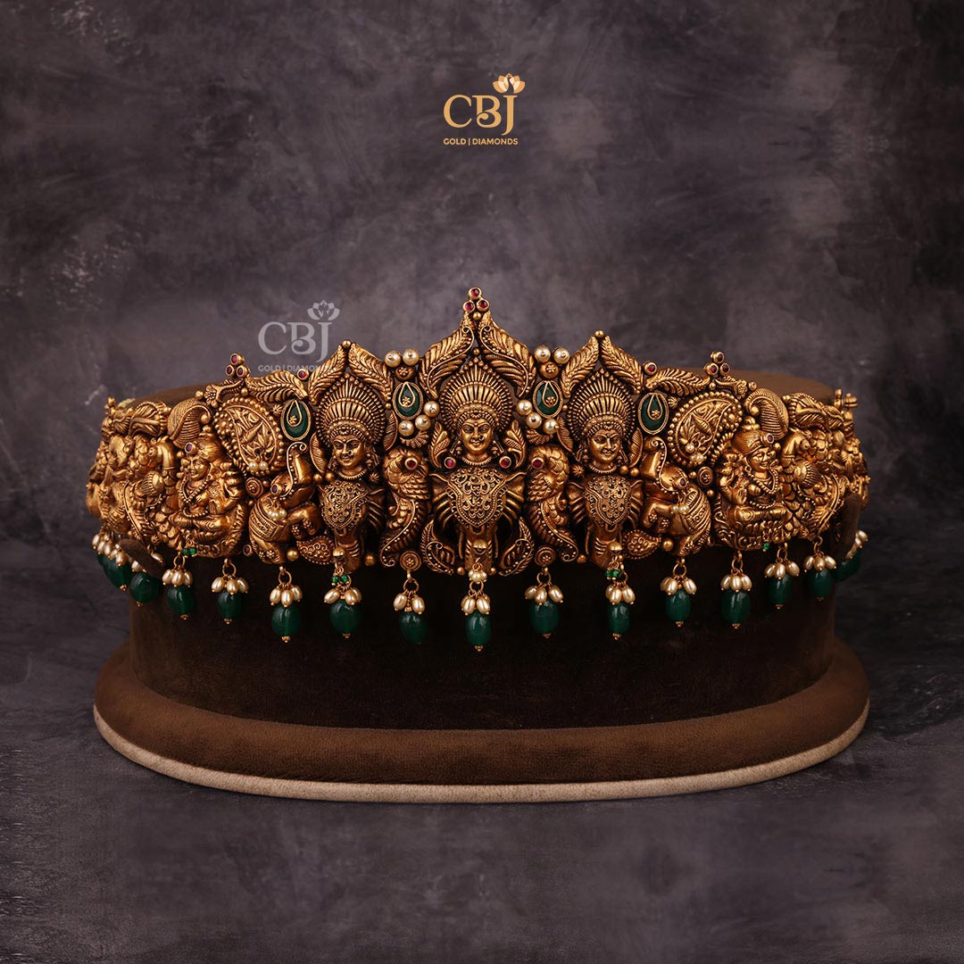 An example of exemplary craftsmanship. A bold antique Lakshmi Vaddanam designed to perfection, featuring stones like pearls, rubies and emeralds.