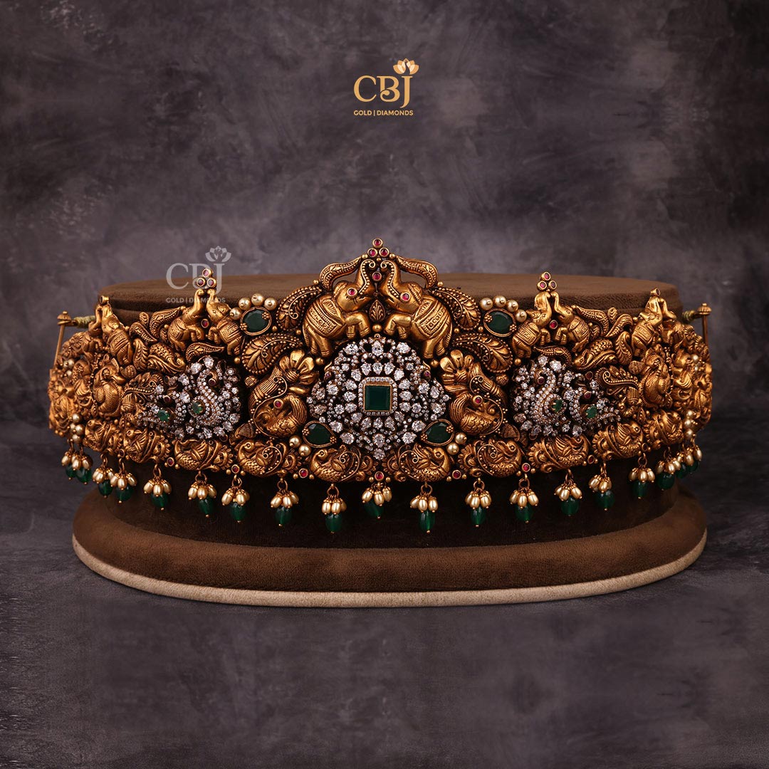 This fusion vaddanam classic culmination of antique 22k gold and cz jewellery.