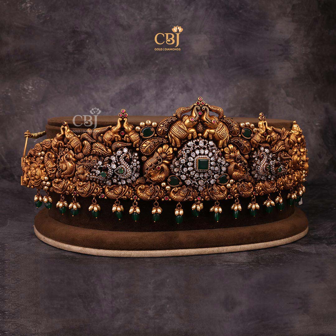 This fusion vaddanam classic culmination of antique 22k gold and cz jewellery.