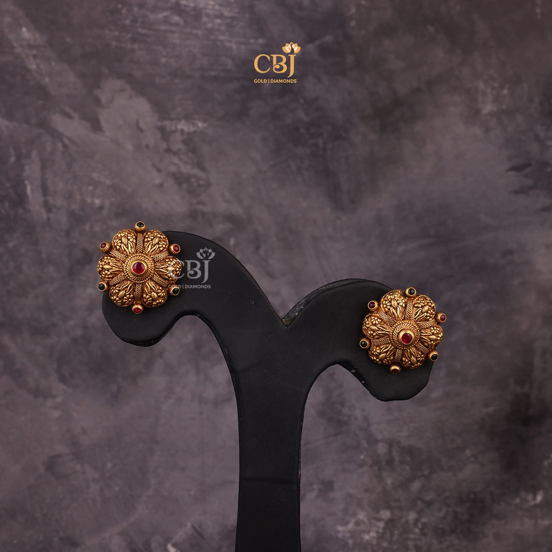 Discover Timeless Appeal with this Ruby studded Antique Temple Studs.