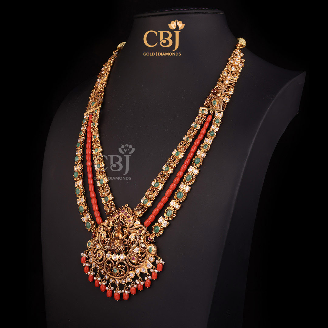 A regal 3 step CZ Pachi long haram embellished with corals