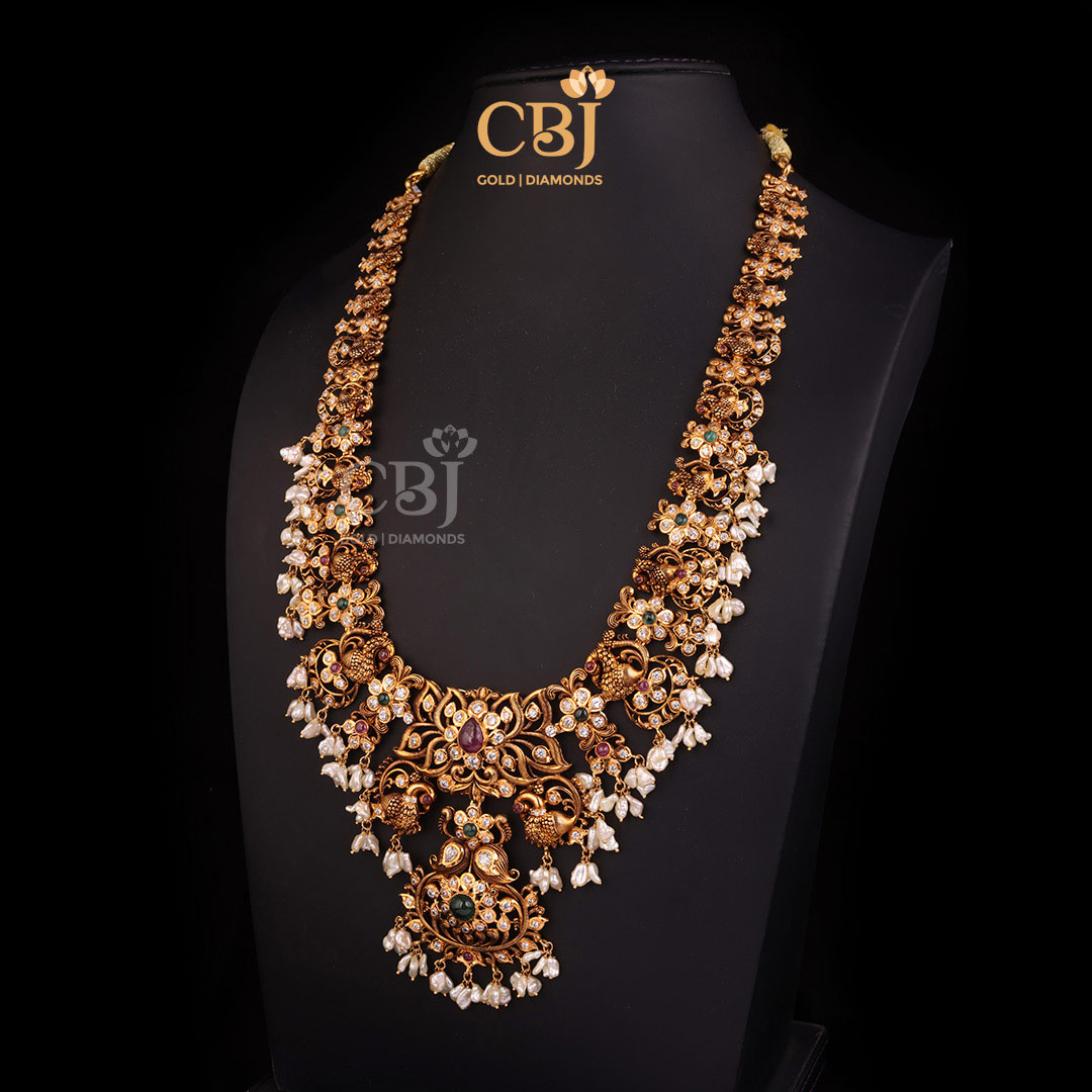 An enchanting CZ Pachi long haram featuring a slender design with floral patterns.