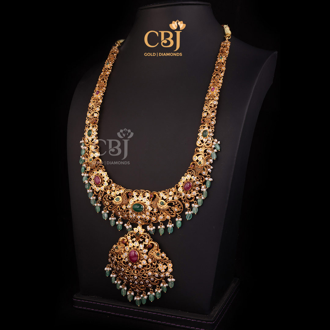 A CZ Pachi long U haram featuring an elaborate design decorated with rubies