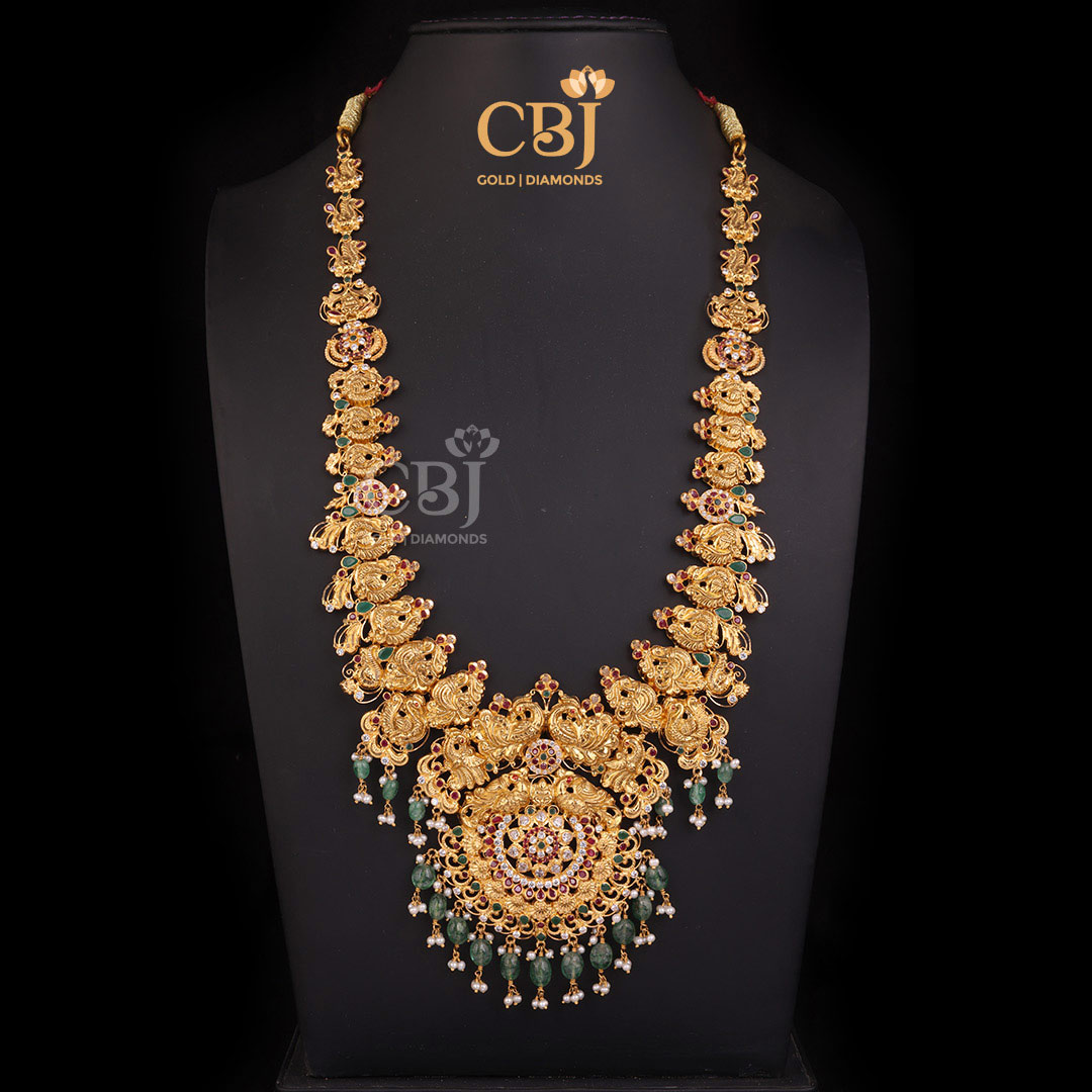 A majestic CZ pachi light weight long haram featuring peacock motifs.