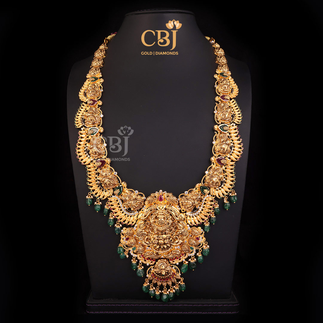 A distinguishable Lakshmi long haram with a nail design. 