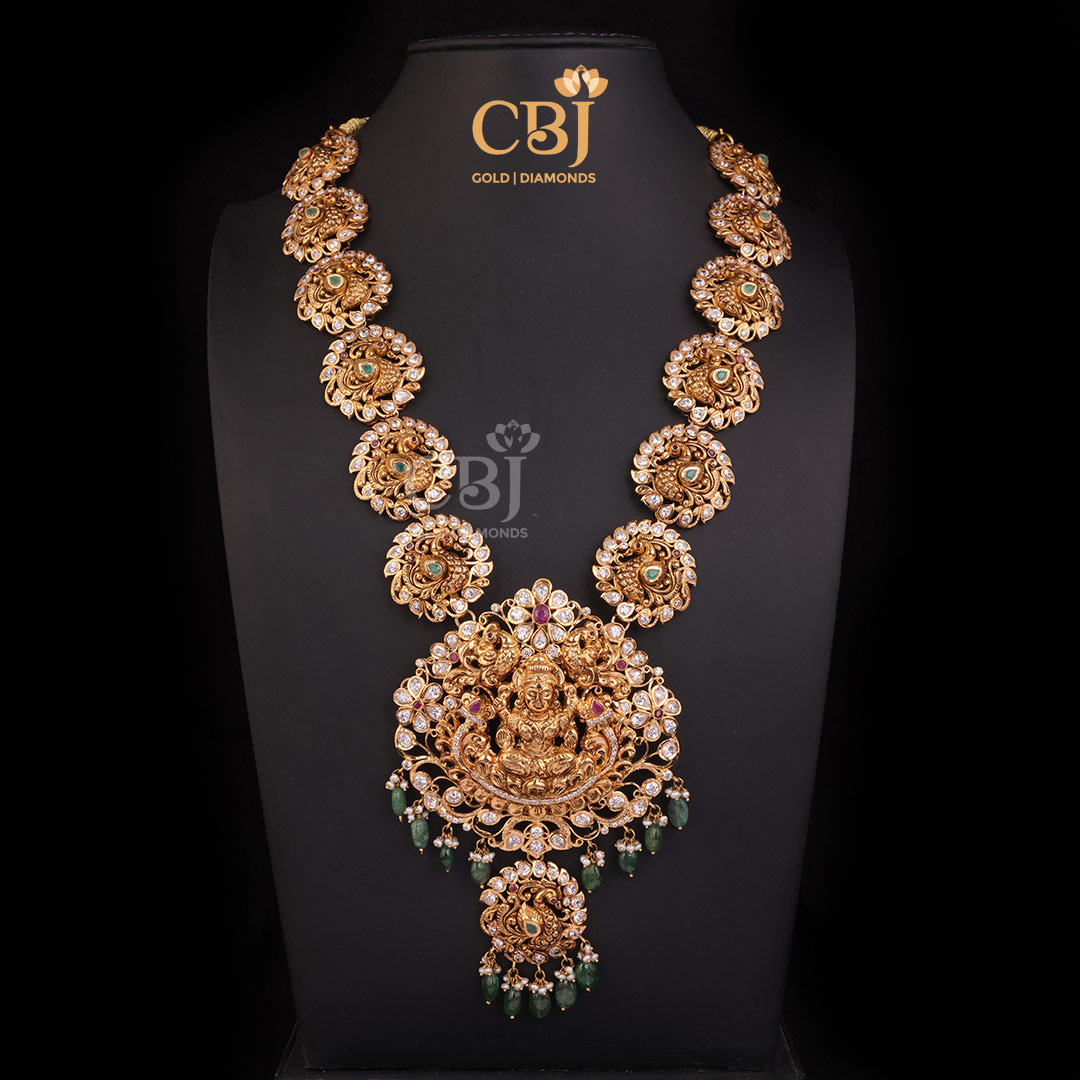 A mystical Lakshmi haram decorated beautifully with CZ stones.