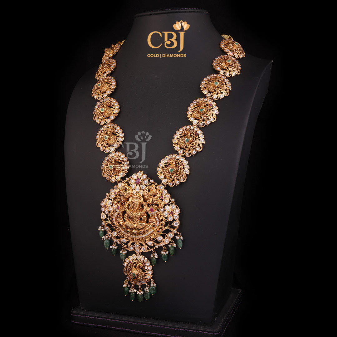 A mystical Lakshmi haram decorated beautifully with CZ stones.