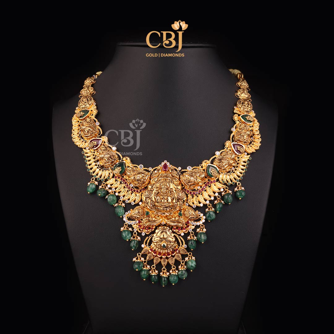A dreamlike Lakshmi necklace featuring CZs, pearls and emeralds.