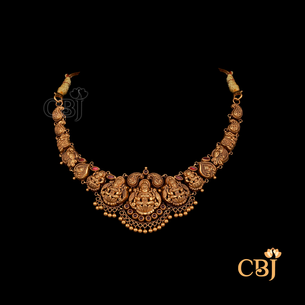 Antique 10 grams Nakshi short gold necklace with intricate surface detailing, textured finish, and compact traditional form.
