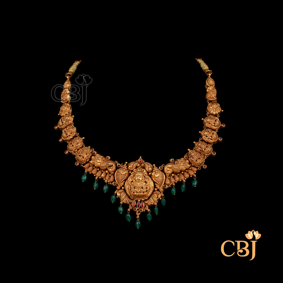 15 grams Nakshi antique short gold necklace with carved traditional detailing, textured gold surface, and compact design structure.