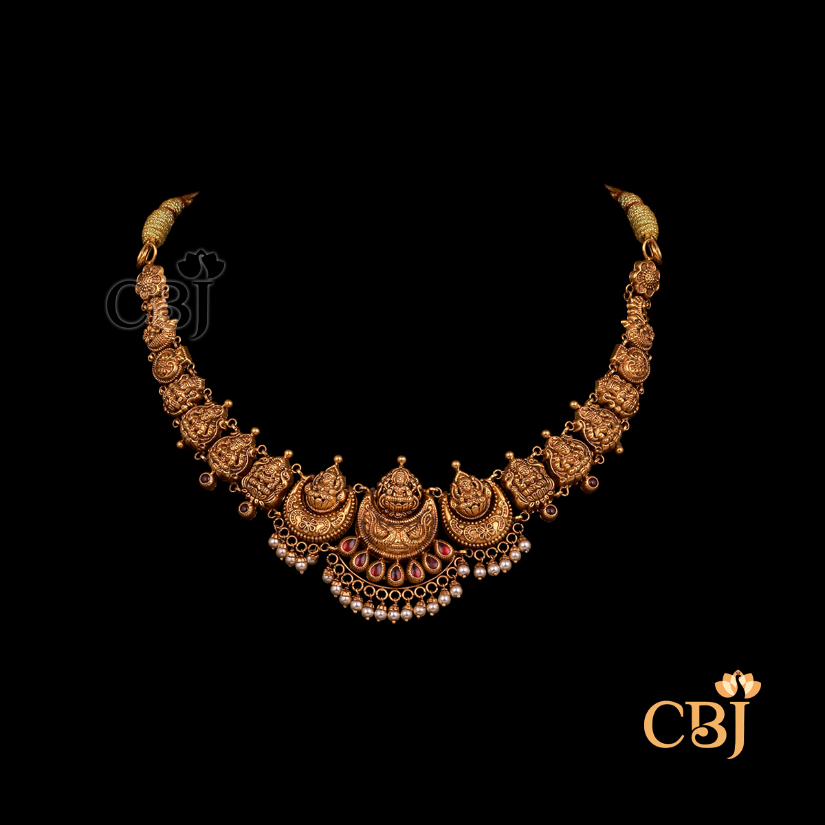 9 grams Nakshi lightweight gold necklace with antique finish, showing delicate handcrafted patterns and a neatly shaped neckline design.