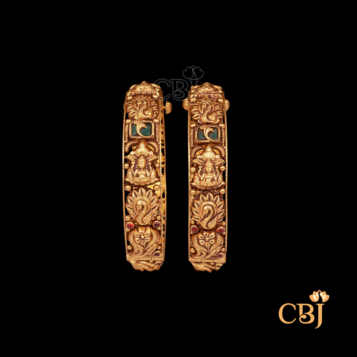 37 grams antique gold bangles set with bold engraved patterns and deep antique gold tone.