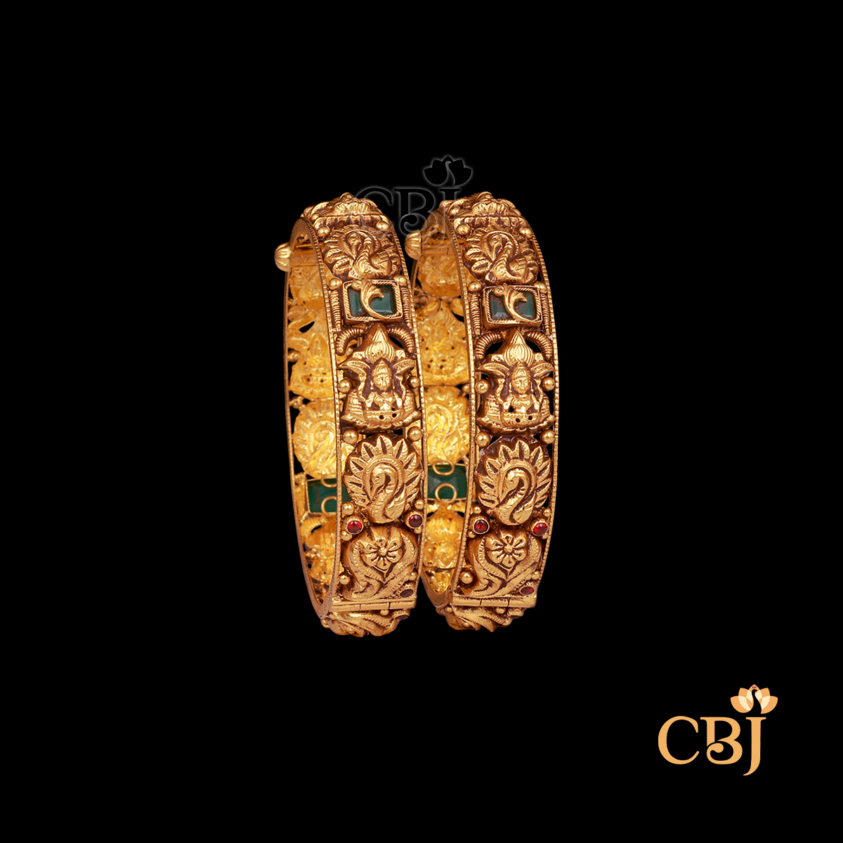 37 grams antique gold bangles set with bold engraved patterns and deep antique gold tone.