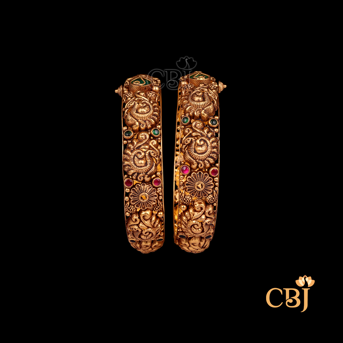 38 grams Nakshi Antique Bangles displayed as a pair of traditional gold bangles with intricate Nakshi carving work, antique finish, and rounded wrist shape.