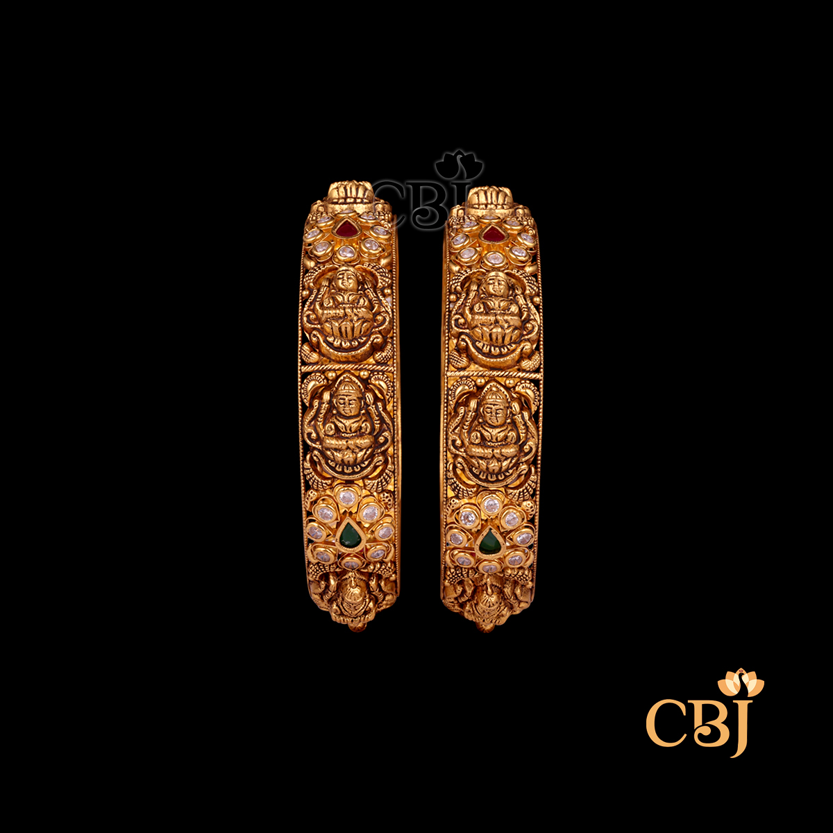 35 grams Nakshi Antique Bangles shown as a pair of gold bangles with detailed Nakshi carvings, antique texture, and a circular wrist shape.