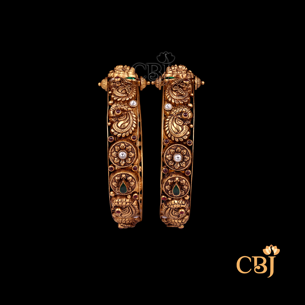 37 grams Nakshi Antique Bangles shown as a pair of gold bangles with carved Nakshi detailing, antique texture, and circular wrist shape.